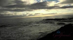 Emily enjoys the shoreline, and a sunset.